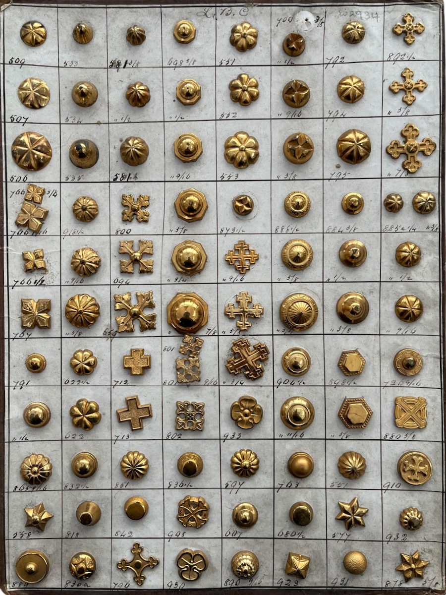 Travellers’ Sample Wallet of Brass Studs.