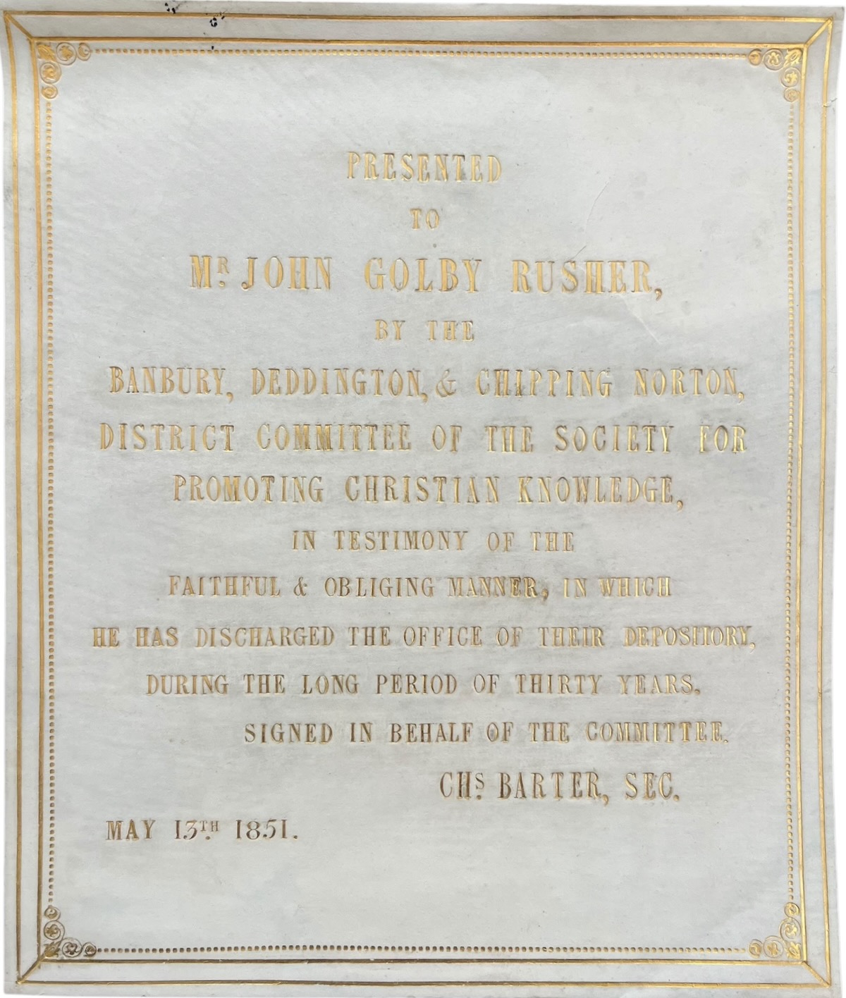[Presentation panel] Presented to Mr. John Golby Rusher, by the Banbury, Deddington, & Chipping Norton, District Committee of the Society for Promoting Christian Knowledge. signed on behalf of the committee, Chas. Barter, Sec.